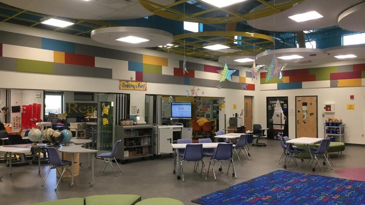 The new annex at Fort Benning's Faith Middle School features rolling chairs and desks that allow students to come together and work in groups. Teachers are encouraged to co-teach.