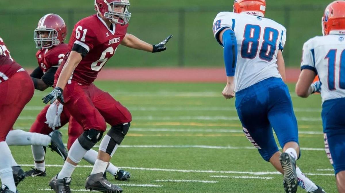 Brenden Fitzgerald (No. 61) goes into pass protection