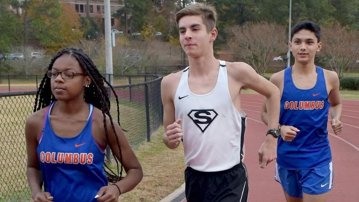 Columbus High School’s Heaven Allen leads All-Bi-City Boys Cross Country Runners of the Year Silas Franklin (Smiths Station) and Alex Salgado (Columbus)