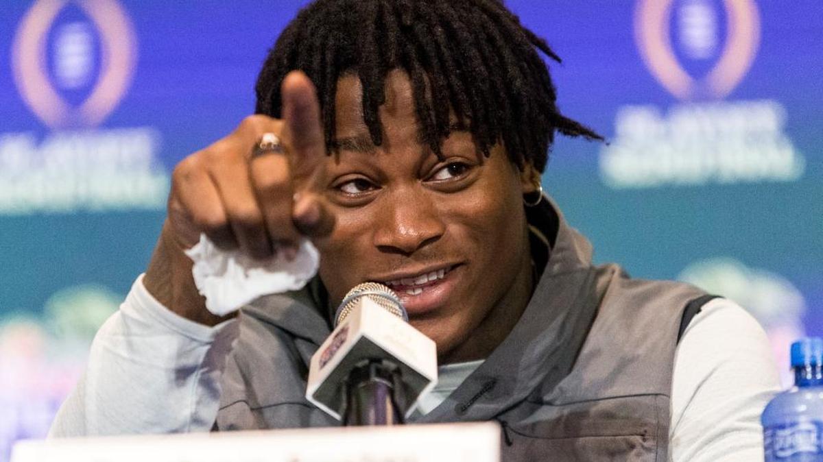 Alabama linebacker Reuben Foster indicates the TV cameras after a reporter jokingly promised not to tell anyone if Foster shared any funny info about Alabama defensive lineman Jonathan Allen, who was in the other press room, during the Alabama defensive press conference for the Peach Bowl on Tuesday.