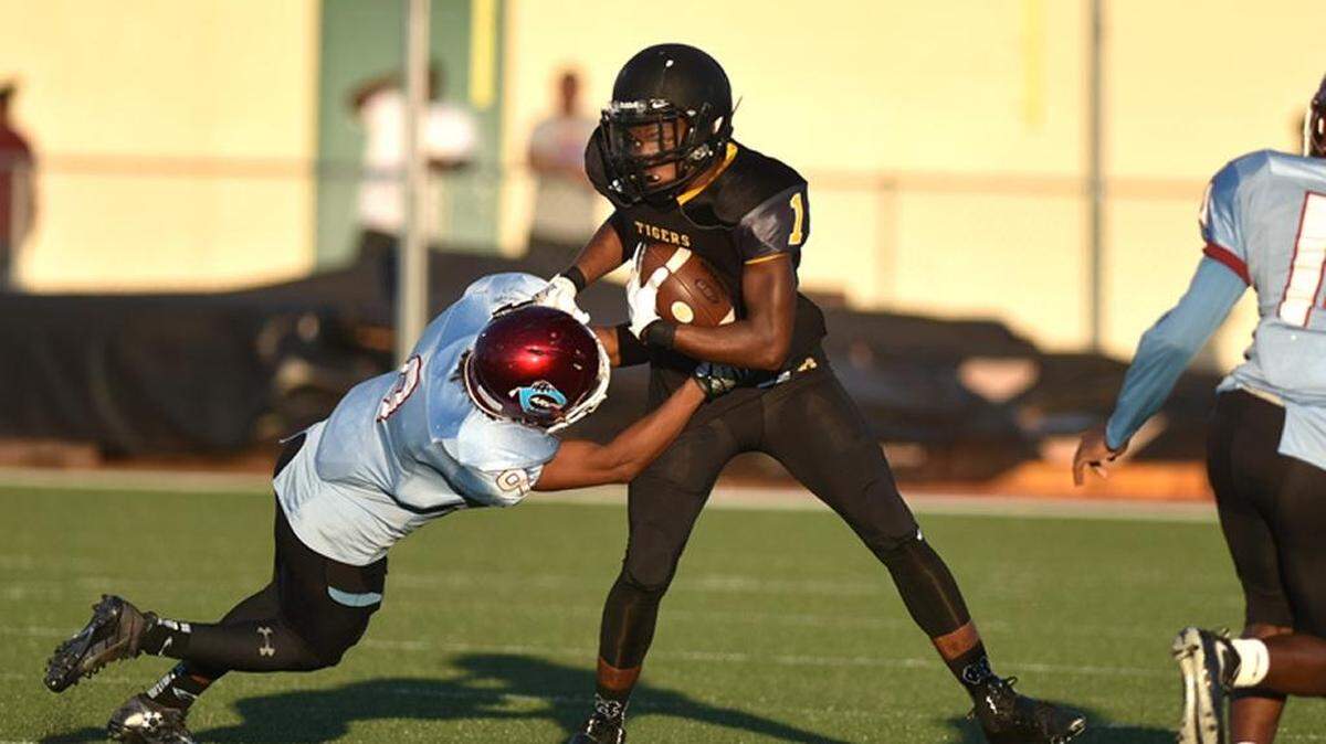 Harris County running back Cal’von Harris takes the carry against Carver on Friday, August 18, 2017