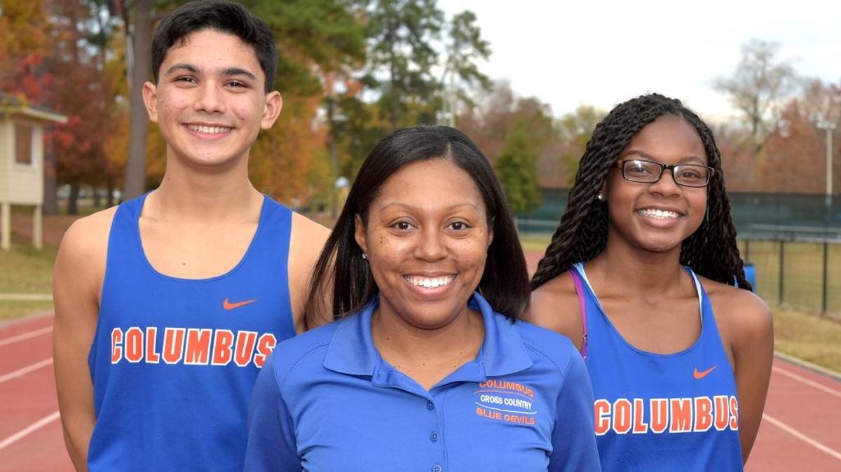 Columbus High School's cross country coach Danielle McCoy joined by All-Bi-City Cross Country Runners of the Year Alex Salgado and Heaven Allen