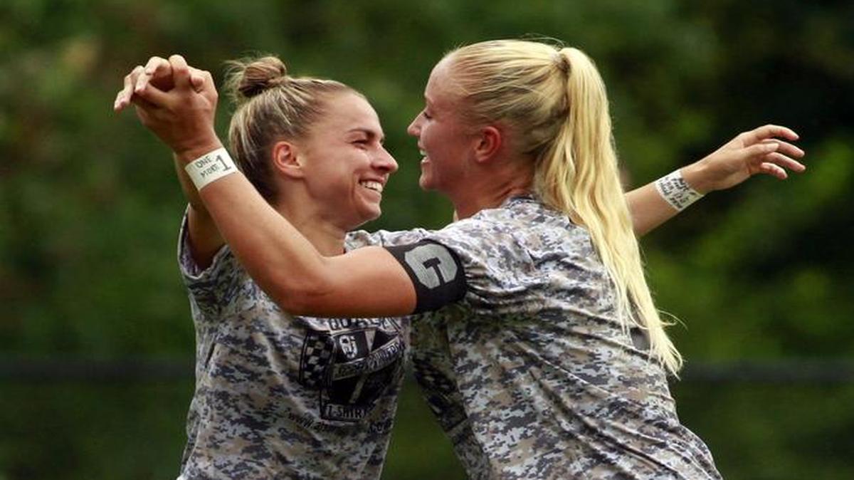 CSU midfielder Flo Spano, left, celebrates with teammate Hugrun Elvarsdottir after Spano got a shot past USC Aiken goalie Karin Cadwaladera for a goal during the first half at CSU’s Walden Soccer Complex.