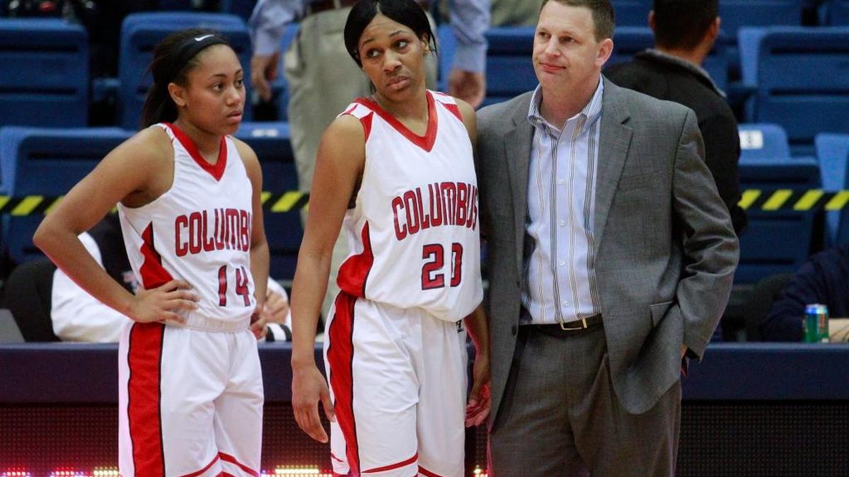 From left, Columbus State players Britteny Tatum and Michelle Mitchell, along with head coach Jonathan Norton, react Sunday afternoon after the Lady Cougars were defeated by Lander University in the Women's Finals of the 25th Annual Peach Belt Conference Basketball Championships at Columbus State University's Lumpkin Center.