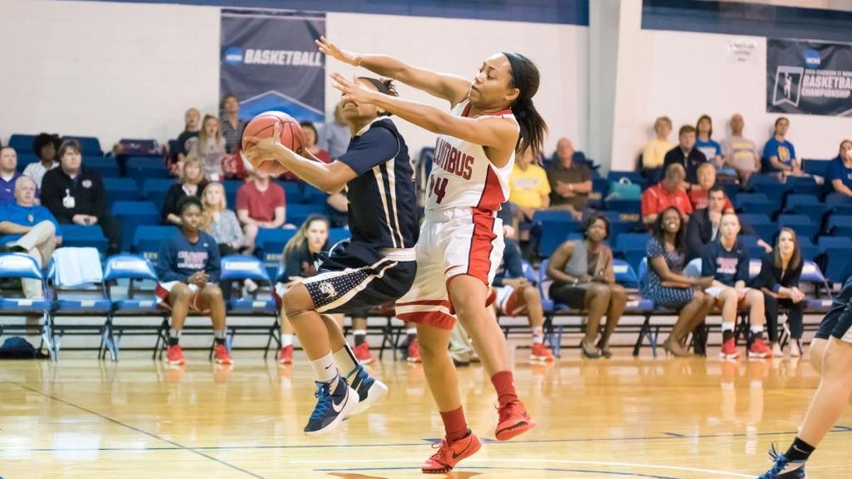 Columbus State's Britteny Tatum plays defense against a Wingate player during Friday afternoon's game.