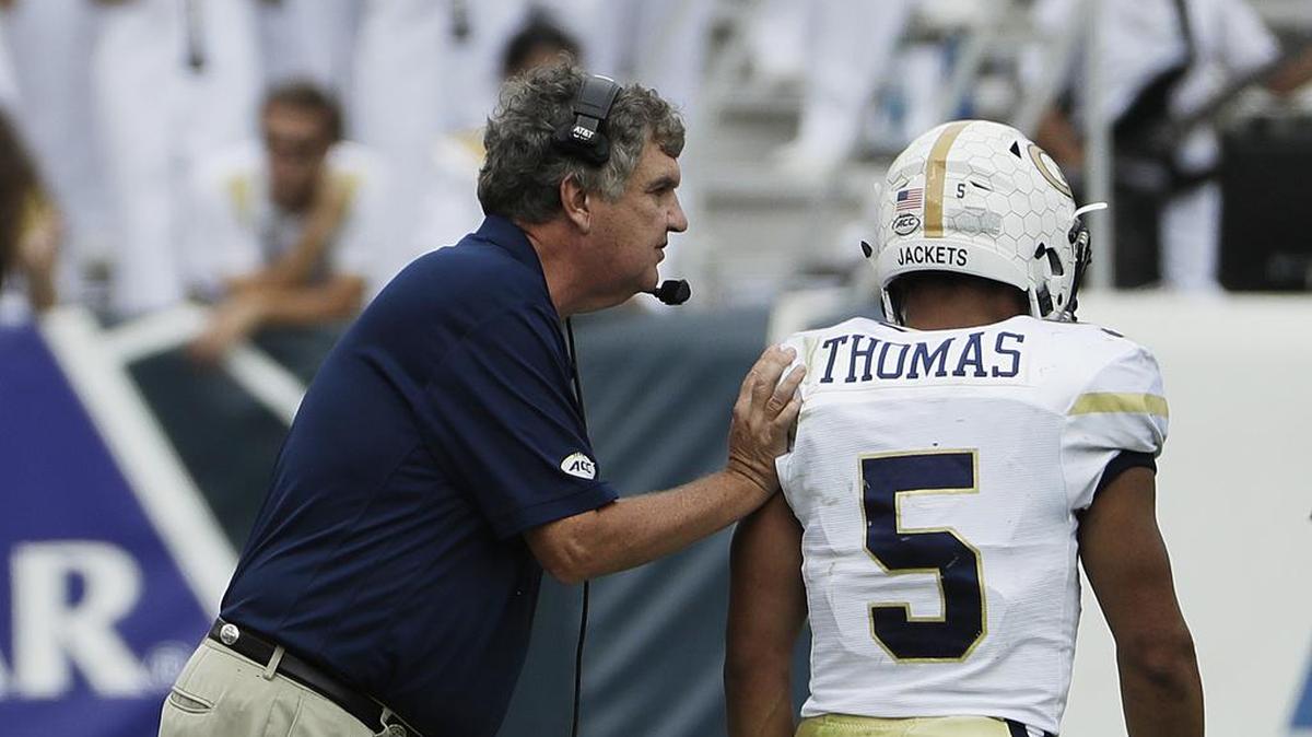 Georgia Tech coach Paul Johnson, left, talks with quarterback Justin Thomas during a game Oct. 15 against Georgia Southern in Atlanta.