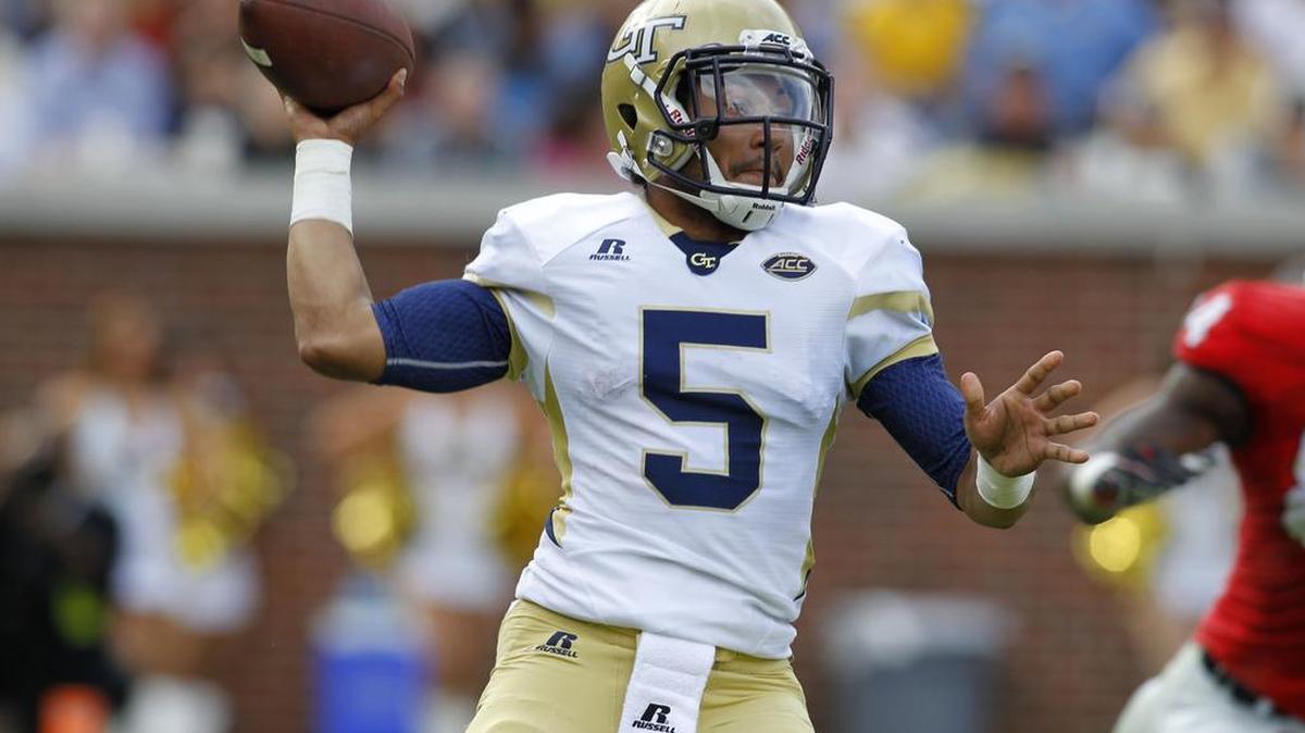 In this Nov. 28, 2015, file photo, Georgia Tech quarterback Justin Thomas passes against Georgia in the second half in Atlanta. Senior quarterback Justin Thomas is eager to play alongside some familiar faces this year. After a sensational 2014 season, Thomas’ statistics and confidence took a hit last season as the injuries mounted across the offense.