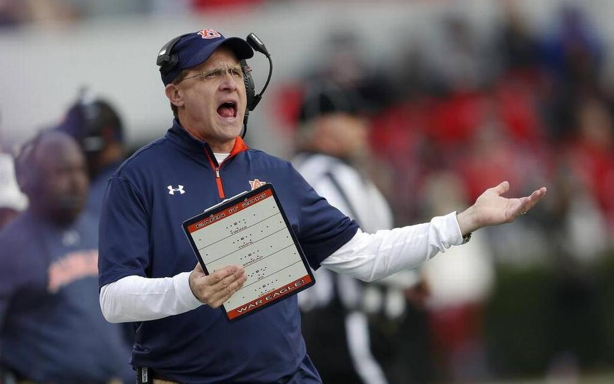 Auburn head coach Gus Malzahn yells at an official during the 2016 game at Georgia.