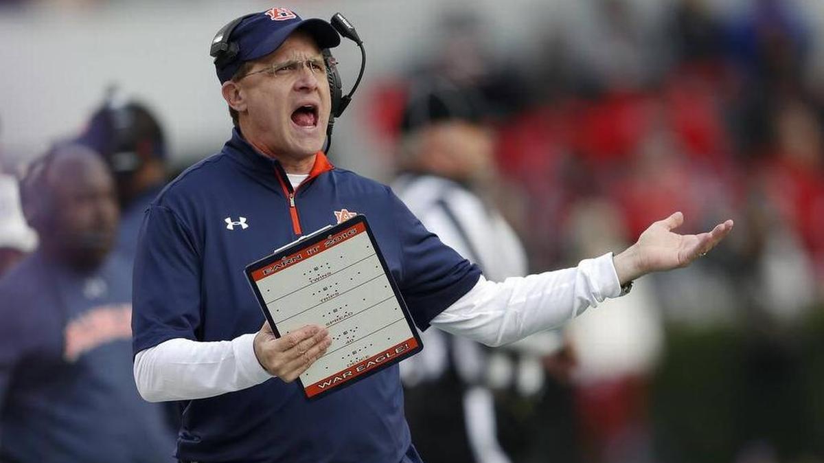 Auburn head coach Gus Malzahn yells at an official during the 2016 game at Georgia.