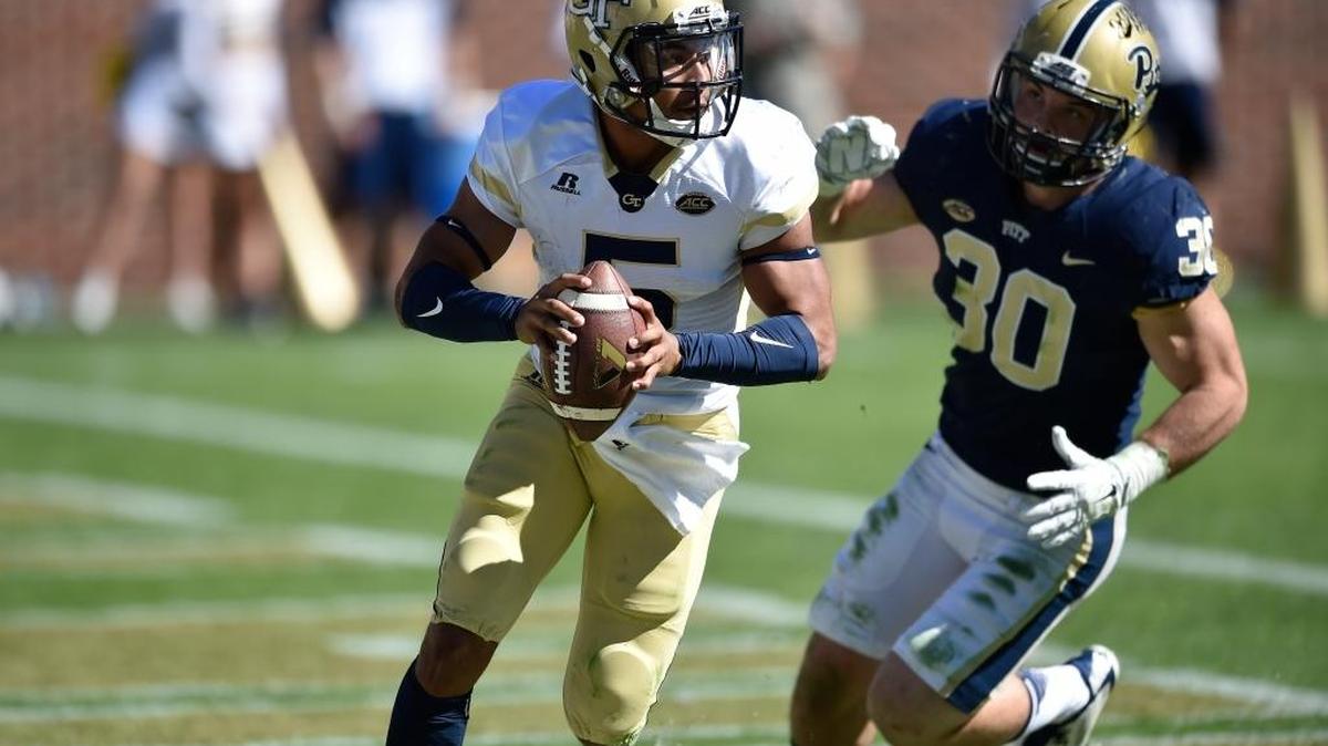 Georgia Tech quarterback Justin Thomas (5) runs out of the pocket in the end zone as Pittsburgh linebacker Mike Caprara (30) looks on during the first half of an NCAA college football game, Saturday, Oct. 17, 2015, in Atlanta.