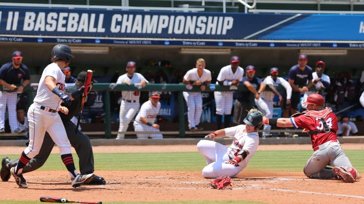 Robert Brooks slides safely to the plate for a run during Columbus State University’s five-run rally in the first inning of Friday’s game against Florida Southern in the NCAA Division II World Series at the USA Baseball Training Center in Cary, N.C.