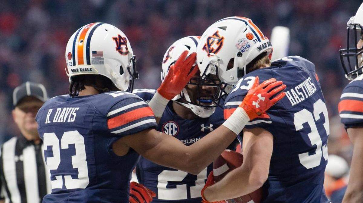 Auburn wide receiver Will Hastings (33) is greeted by Auburn running back Kerryon Johnson (21) after scoring a touchdown Auburn wide receiver Will Hastings (33) catches a touchdown against UCF during the first half of the Peach Bowl NCAA college football game Monday, Jan. 1, 2018, in Atlanta, Ga. Pe Auburn wide receiver Will Hastings (33) is greeted by Auburn running back Kerryon Johnson (21) after scoring a touchdown Auburn wide receiver Will Hastings (33) catches a touchdown against UCF during the first half of the Peach Bowl NCAA college football game Monday, Jan. 1, 2018, in Atlanta, Ga