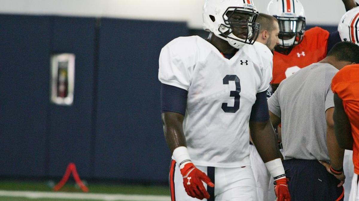 Auburn defensive lineman Marlon Davidson talks to teammates at practice on Saturday, Aug. 6, 2016.