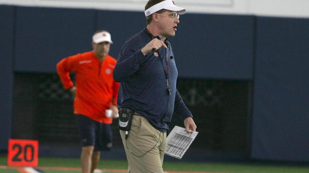 Auburn coach Gus Malzahn yells instructions at the university's athletic complex Tuesday, April 5, 2016.