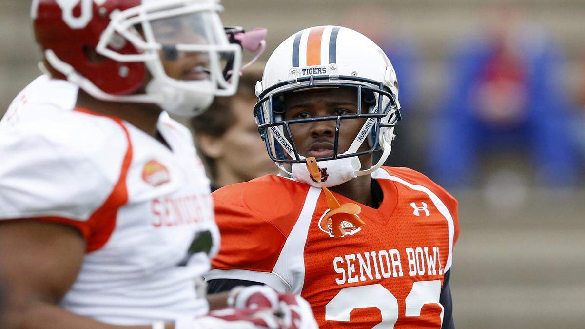 Auburn's Jonathan Jones, No. 23, runs through drills for the South during NCAA college football practice for the Senior Bowl, Tuesday, Jan. 26, 2016, at Fairhope Municipal Stadium, in Fairhope, Ala. (Brynn Anderson | AP Photo)