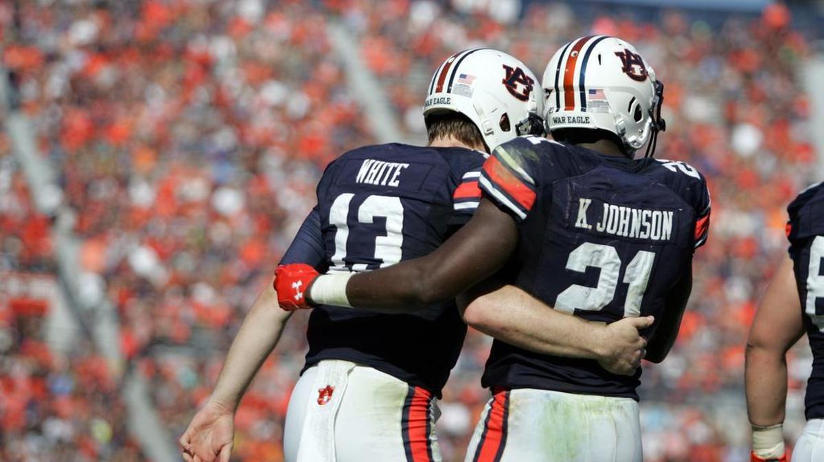 Auburn quarterback Sean White and running back Kerryon Johnson celebrate a touchdown against ULM Saturday, Oct. 1, 2016 at Jordan-Hare Stadium