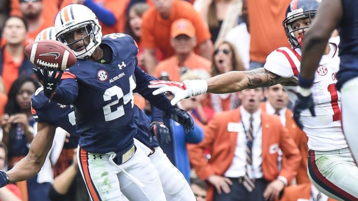 Auburn defensive back Blake Countess, No. 24, goes for an interception against Ole Miss on Saturday, Oct. 31, 2015.