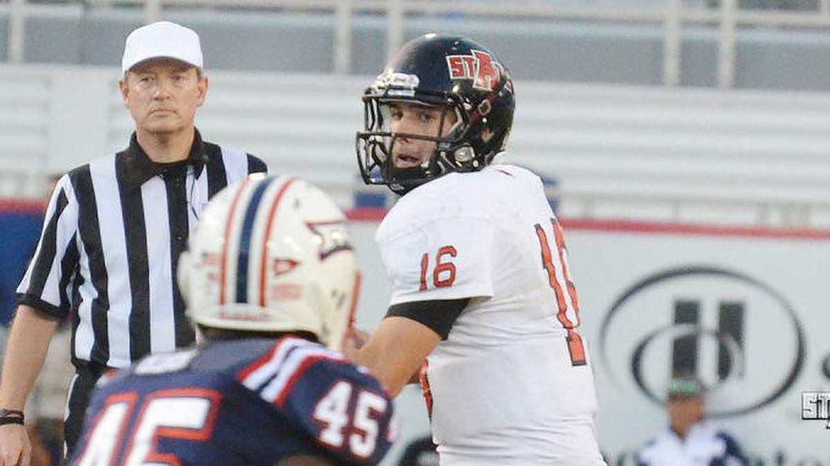 Former Arkansas St. quarterback Ryan Aplin drops back to throw.