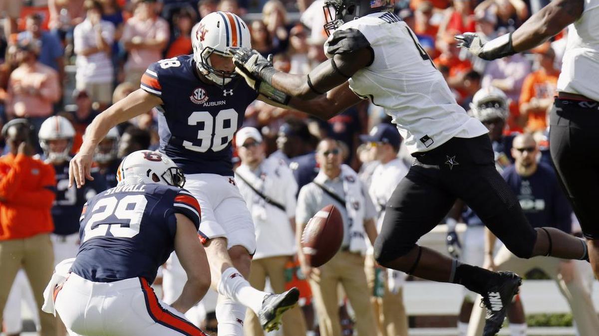 Vanderbilt's Zach Cunningham, right, blocks a field goal attempt of Auburn's Daniel Carlson in the second half Saturday, Nov. 5, 2016 at Jordan-Hare Stadium.