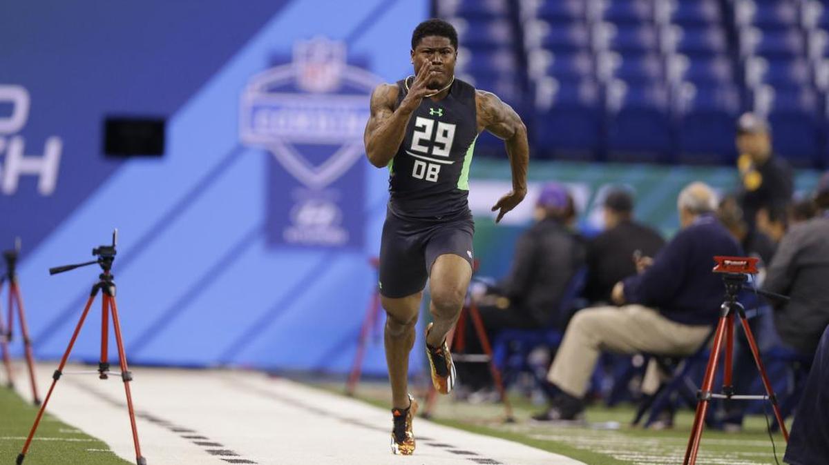 Auburn defensive back Jonathan Jones runs a drill at the NFL football scouting combine in Indianapolis, Monday, Feb. 29, 2016.