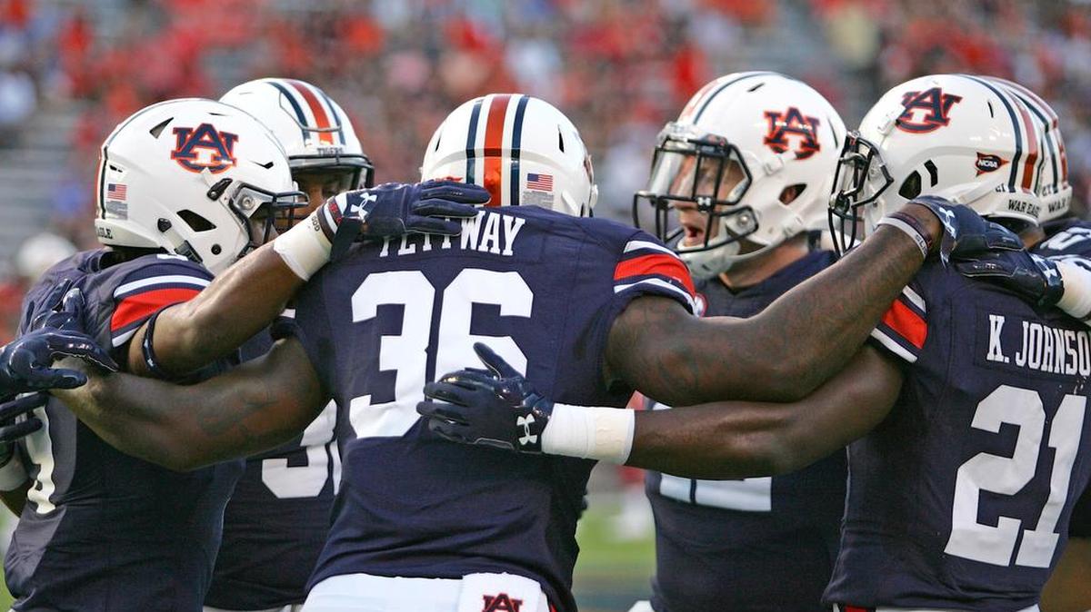 Auburn's running backs huddle up before the Arkansas State game Saturday, Sept. 10, 2016 at Jordan-Hare Stadium.