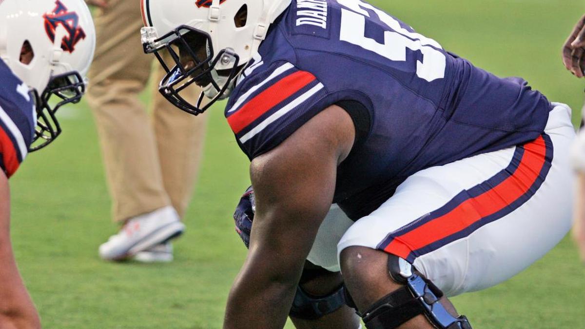 Auburn center Xavier Dampeer warms up before the Arkansas St. game Saturday, Sept. 10, 2016.