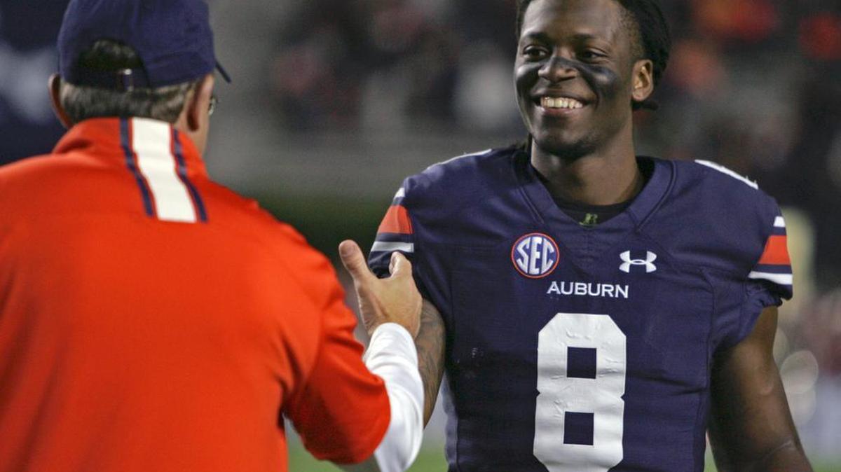 Auburn wide receiver Tony Stevens greets coach Gus Malzahn on Senior Day before facing Alabama A&M during the 2016 season.