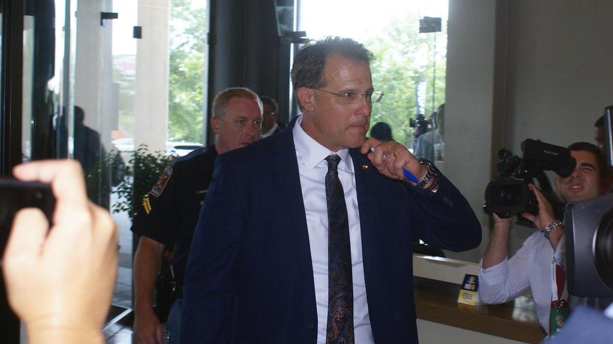 Auburn coach Gus Malzahn arrives at the Wynfrey Hotel in Hoover, Alabama for the SEC Media Days on Monday, July 11, 2016.