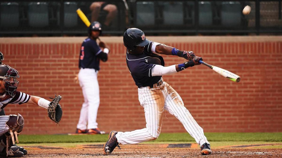 Auburn outfielder Anfernee Grier, No. 10, gets a hit against Texas A&M.