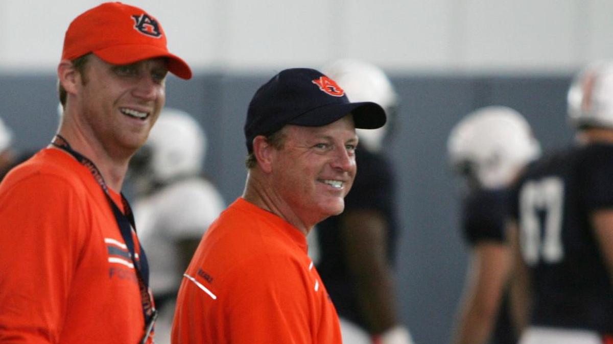 Auburn assistant Tim Horton, right, teamed up with his wife Lauren to surprise the family members of Auburn players