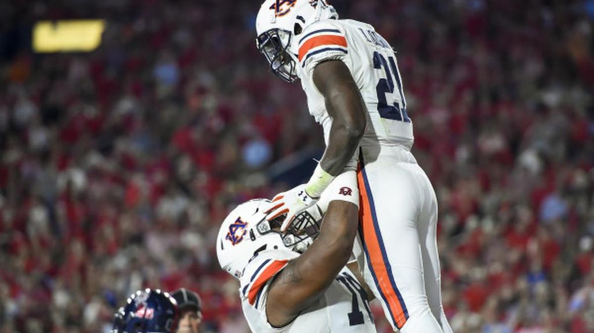 Auburn running back Kerryon Johnson celebrates a touchdown in a 40-29 win over Ole Miss Saturday, Oct. 29 in Oxford, Miss.
