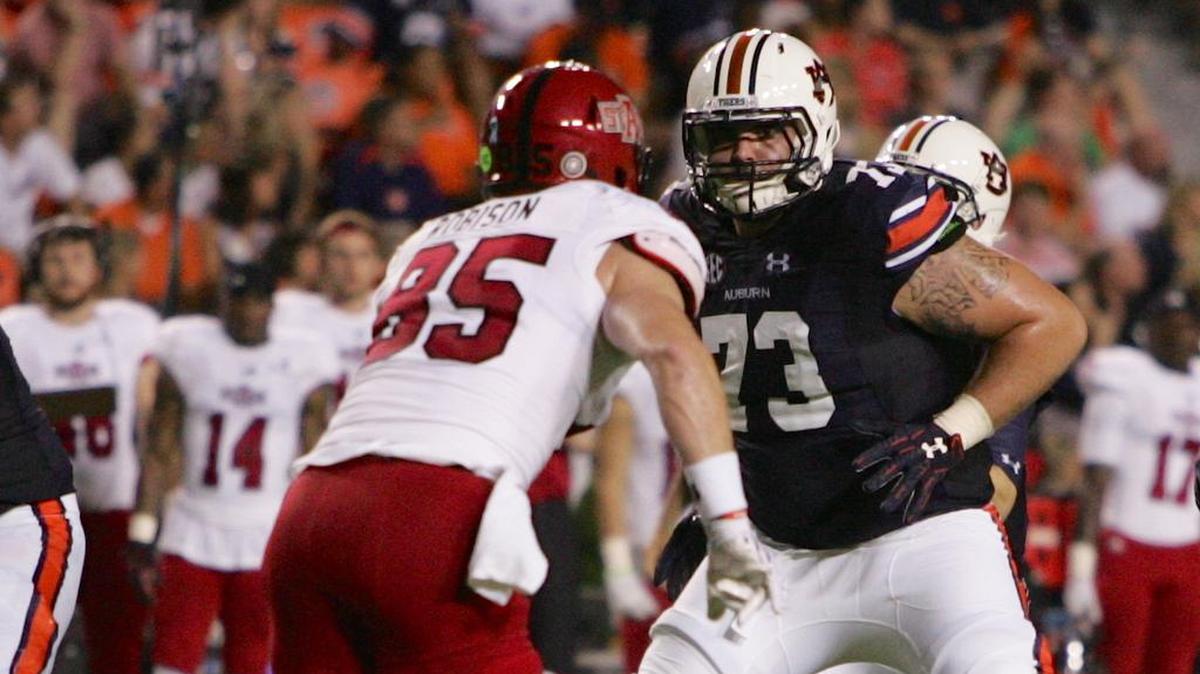 Auburn offensive line Austin Golson blocks an Arkansas St. defensive lineman Saturday, Sept. 10, 2011 at Jordan-Hare Stadium.
