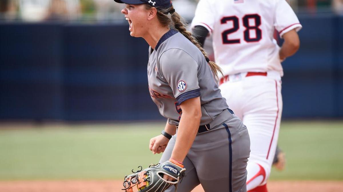 Auburn's Emily Carosone, No. 5, gets the game-winning out against Arizona in game two of the Super Regional on Sunday, May 29, 2016.
