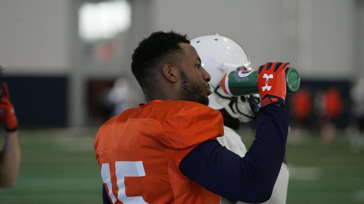 Auburn defensive back Josh Holsey takes a quick drink break during spring practice on March 29, 2016.