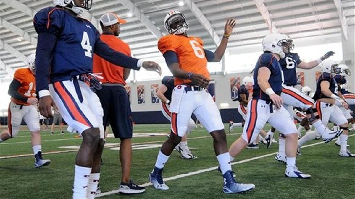 Auburn's football team returns to the practice field on Tuesday with Jeremy Johnson (No. 6) ready to compete for the starting quarterback job.