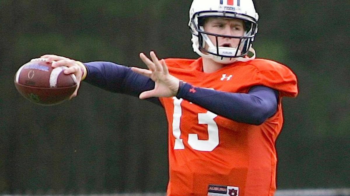 Auburn quarterback Sean White throws during practice for the Birmingham Bowl last December.