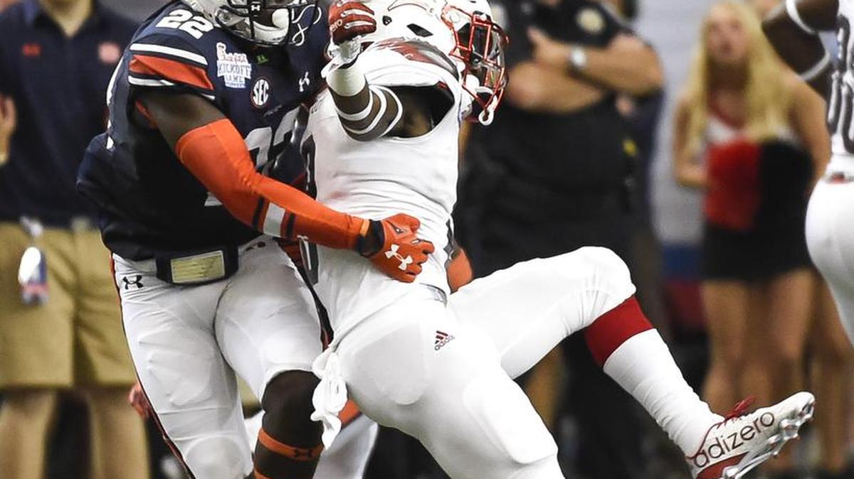 Tim Irvin (22) breaks up a pass. Louisville vs Auburn in Atlanta, Ga. on Saturday, Sept. 5, 2015. Zach Bland/Auburn Athletics