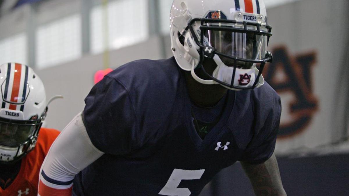 John Franklin III, pictured stretching on Tuesday, March 7, isn't wearing the orange non-contact jersey at practice.