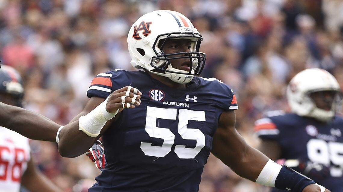 Auburn DL Carl Lawson (55) playing against Ole Miss on Saturday, Oct. 31, 2015.
(Zach Bland/Auburn Athletics)