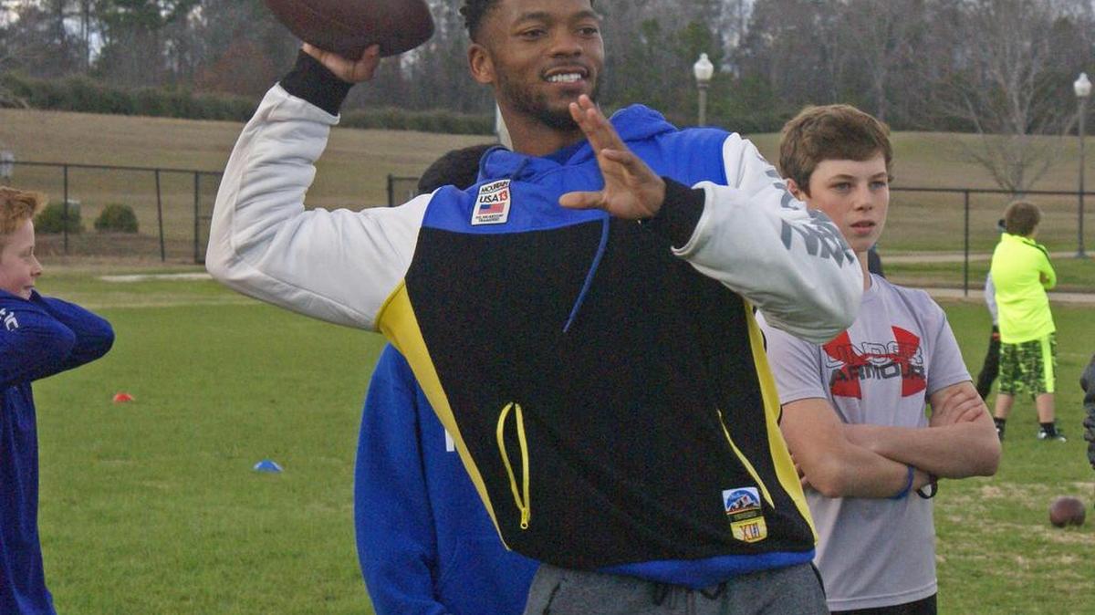 Former Auburn quarterback Nick Marshall runs a camp at the Wire Road Sports Complex Sunday, Jan. 28, 2017.