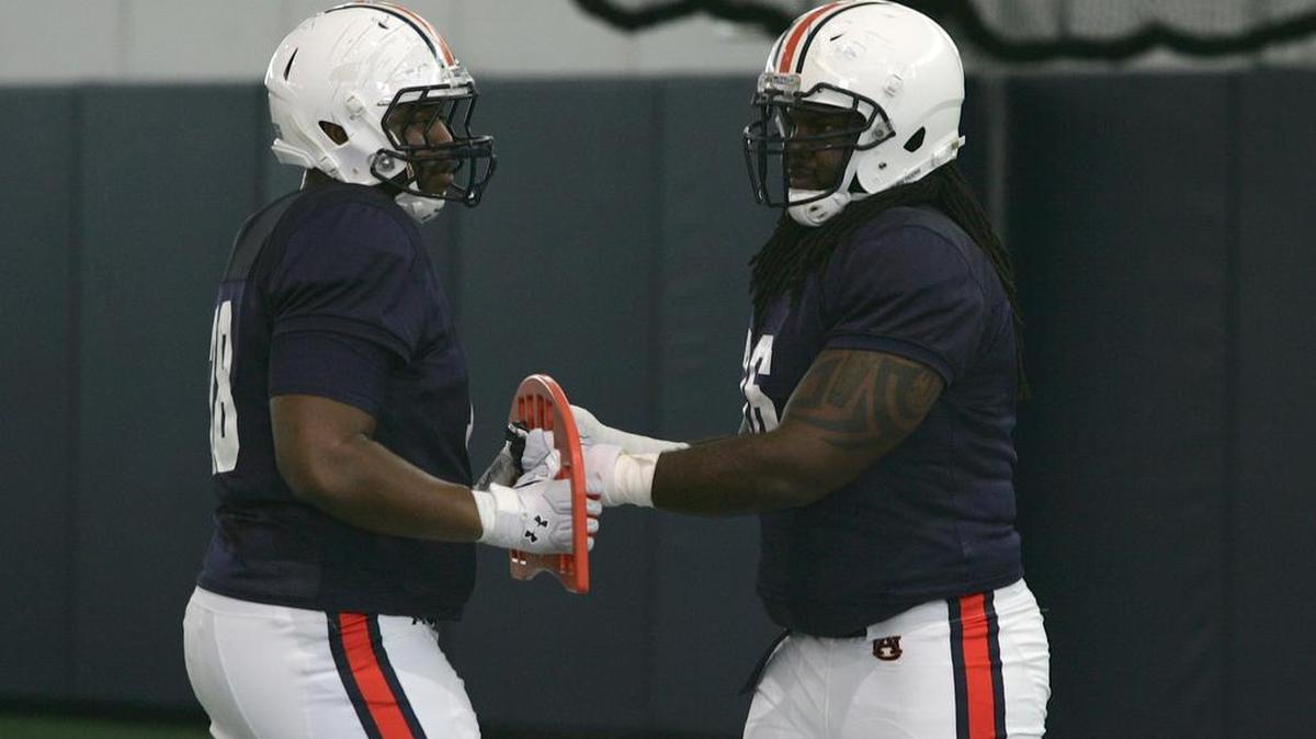 Former Auburn offensive lineman Jordan Diamond, No. 76, practices on March, 2016.