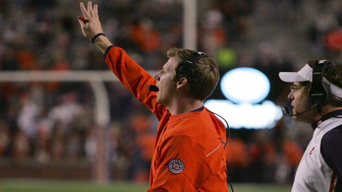 Auburn offensive coordinator Rhett Lashlee directs the offense Saturday, Nov. 21, 2015 in a 56-34 win over Idaho at Jordan-Hare Stadium. (Michael Niziolek | Ledger-Enquirer.com)