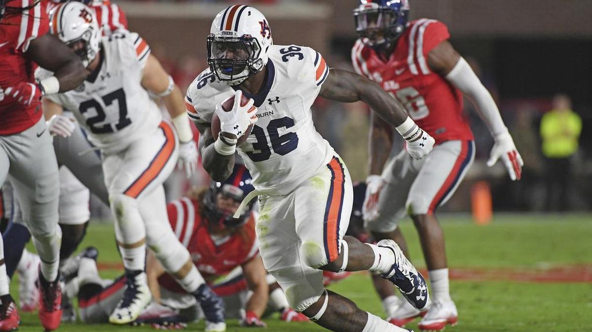 Auburn running back Kamryn Pettway, No. 36, carries the ball against Ole Miss in Oxford, Miss., Saturday, Oct. 29, 2016.