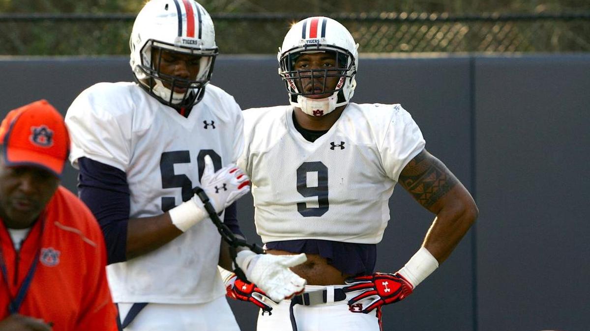 Auburn defensive lineman Byron Cowart watches drills at spring practice on March 8, 2016.