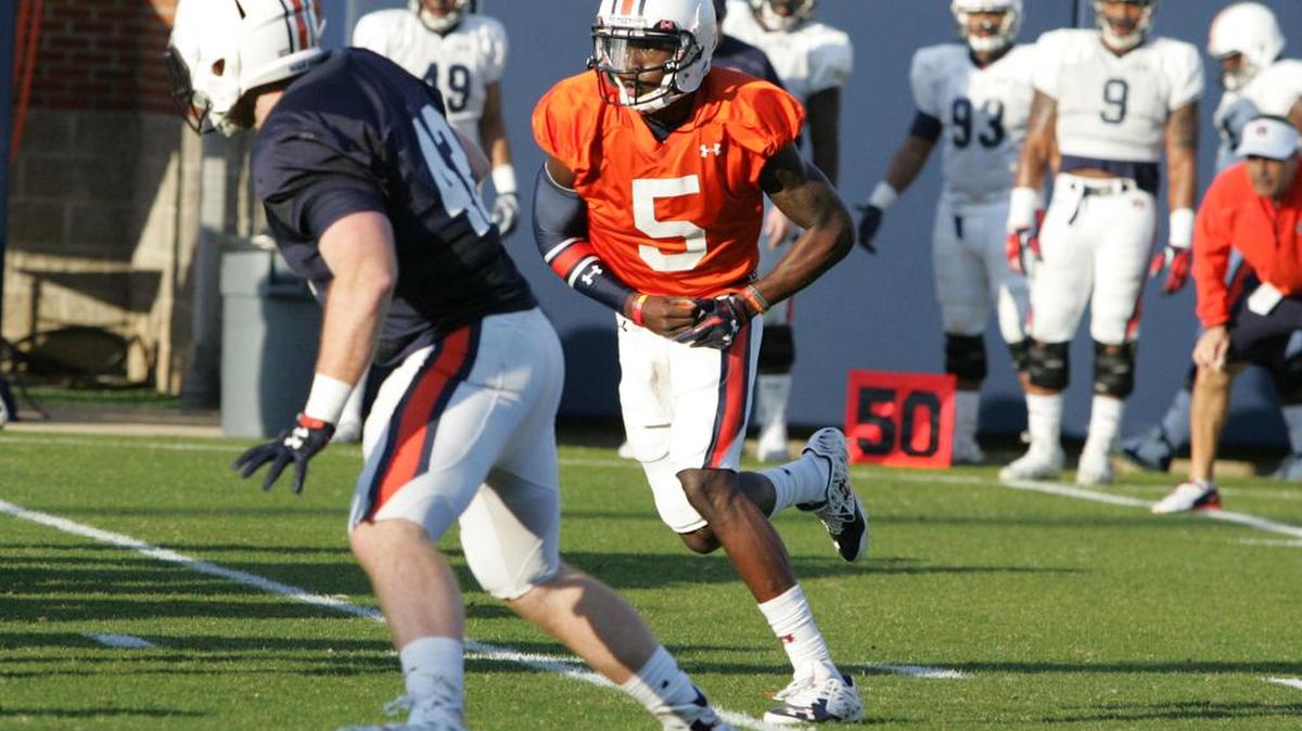 Auburn quarterback John Franklin III runs a fake during spring practice at the university's athletic complex Tuesday, March 8, 2016.