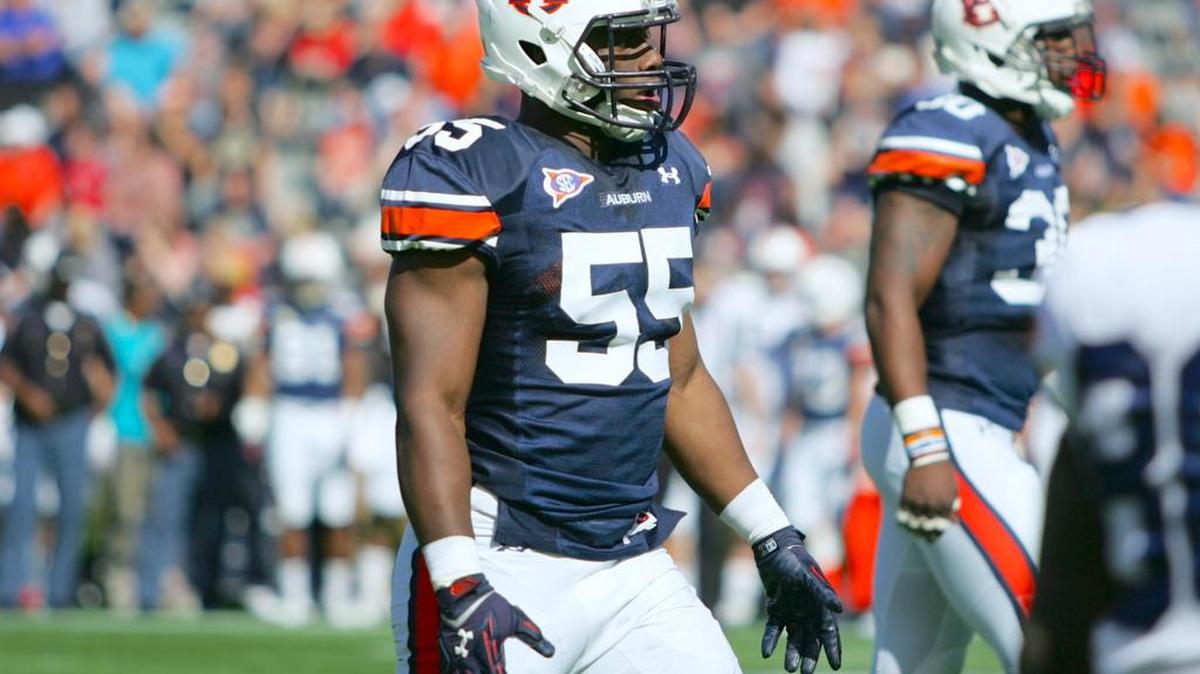 Auburn defensive lineman Carl Lawson lines up during the team's annual spring game.