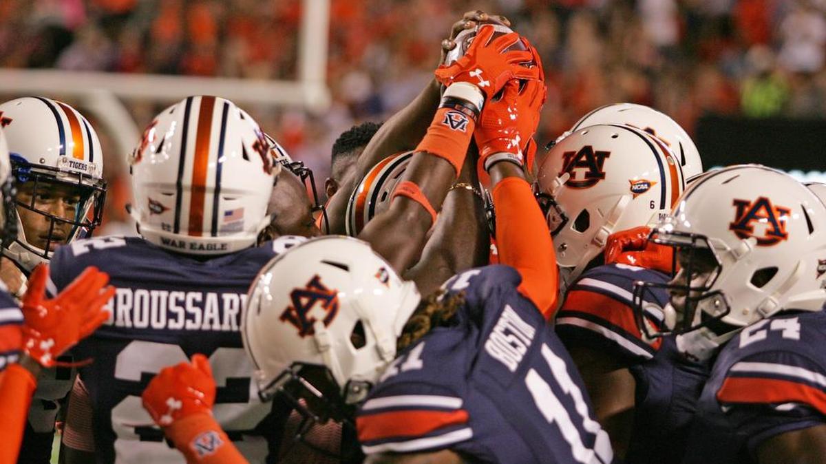 Auburn's secondary gathers on the field prior to playing Clemson Saturday, Sept. 3, 2016 at Jordan-Hare Stadium.