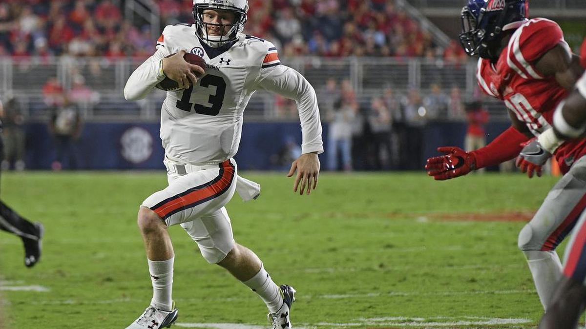 Auburn quarterback Sean White (13) runs the ball during the first half of an NCAA college football game against Mississippi in Oxford, Miss., Saturday, Oct. 29, 2016.