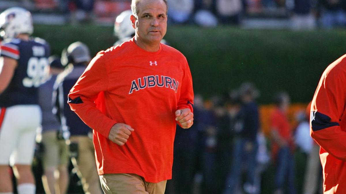Auburn defensive coordinator Kevin Steele runs onto the field before the Arkansas game Oct. 22, 2016 at Jordan-Hare Stadium.
