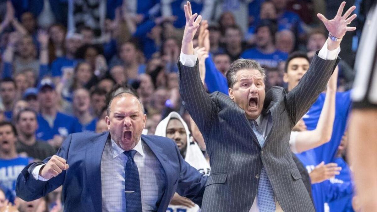 Kentucky Wildcats head coach John Calipari and assistant coach Tony Barber reacted to a call during the second half as host UK defeated Vanderbilt 73-67 at Rupp Arena Tuesday Feb. 28, 2017 in Lexington, Ky.